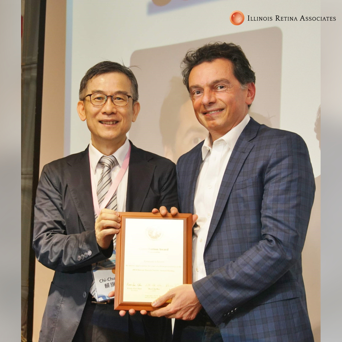 Dr. Rezaei receiving an award